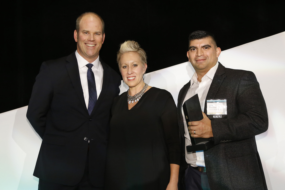 Owners, Cheryl + Luis Stauffer with Patrick Terrien of Columbus Council on World Affairs.