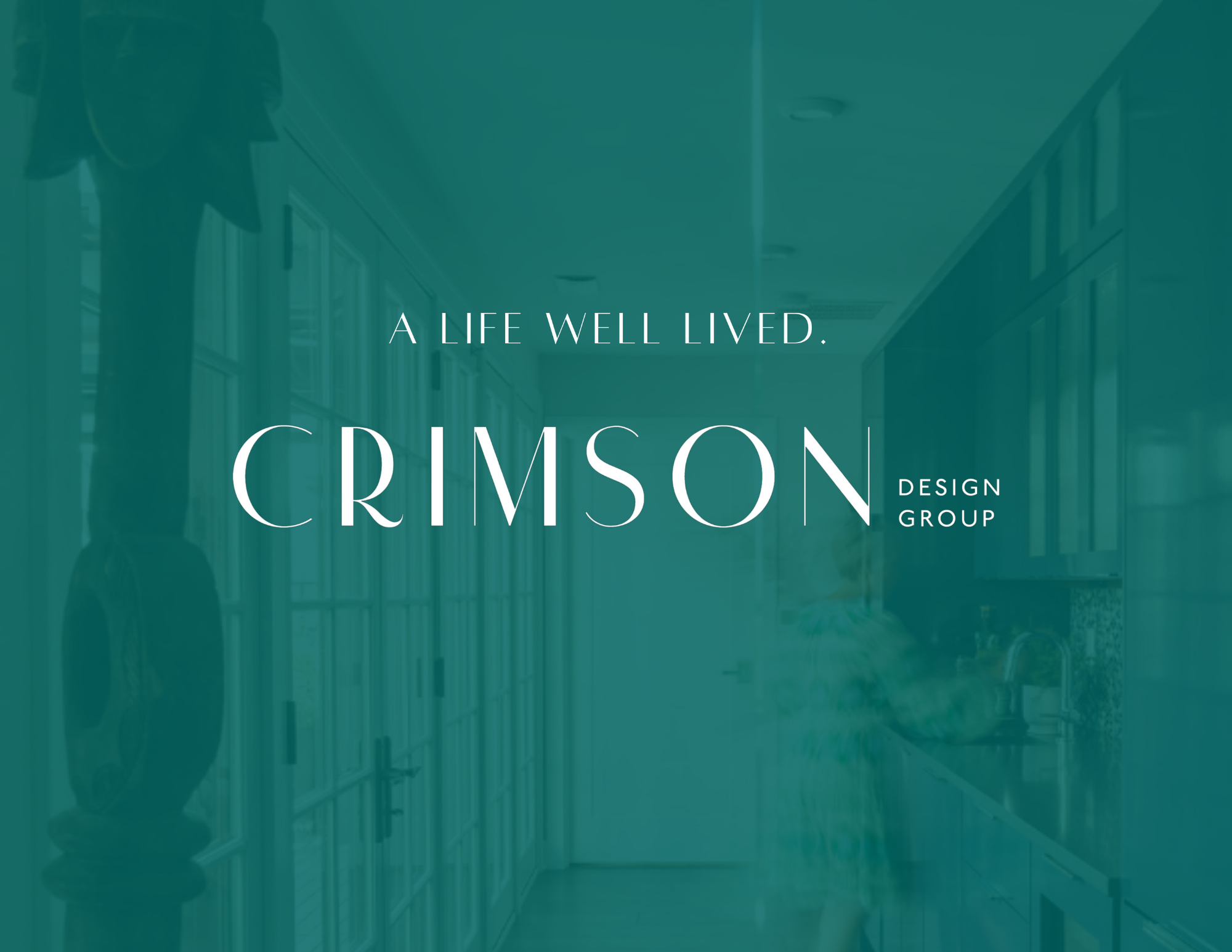 Emerald green overlay over interior design photography with title "Crimson Design Group" and caption "A Life Well Lived" in white text