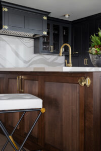 dark wooden cabinets and cambria slab