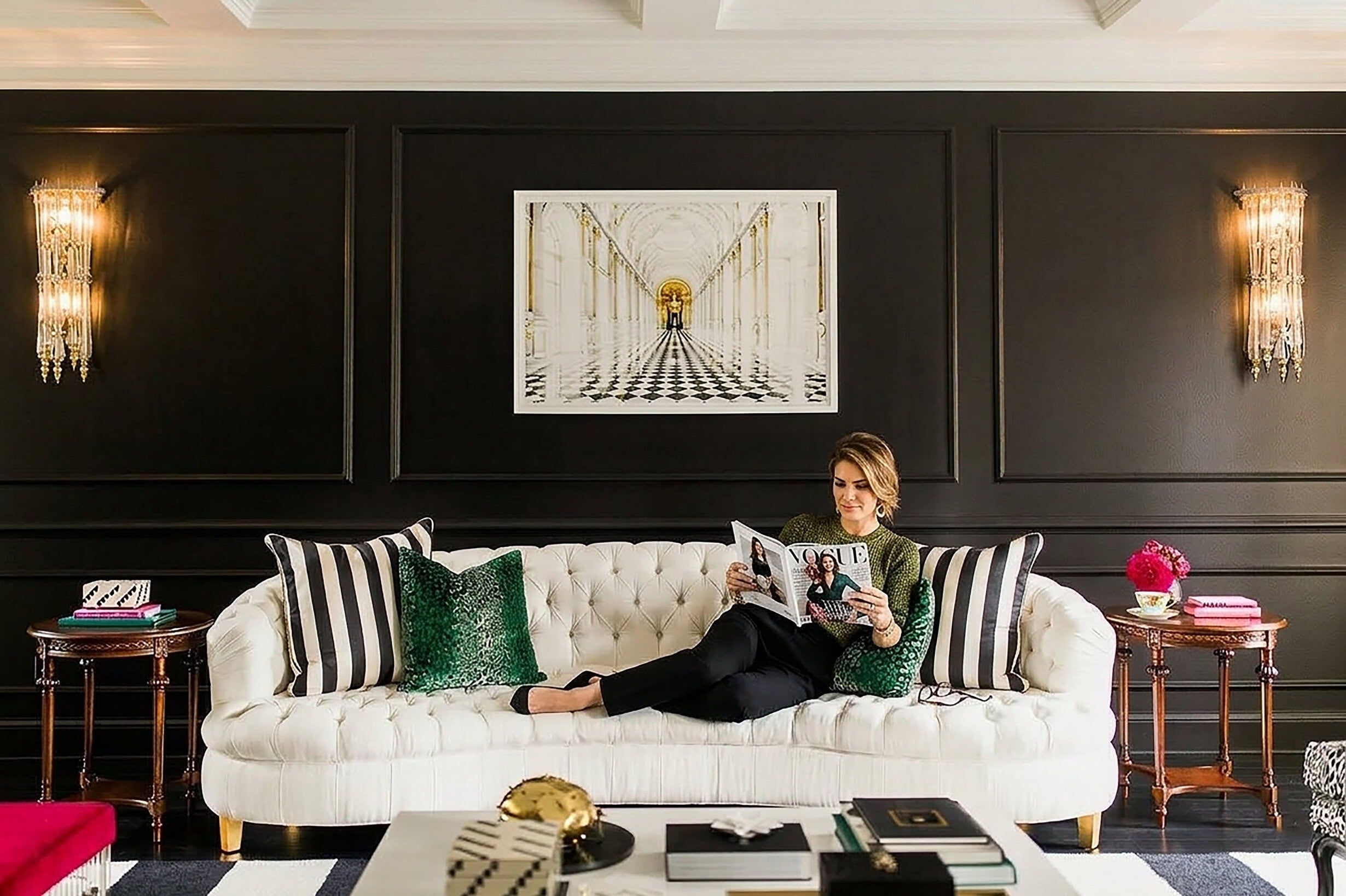 Modern luxury living room with velvet headboard and gold lighting