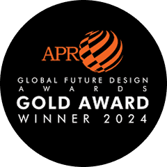 Black circular badge with orange and white text reading 