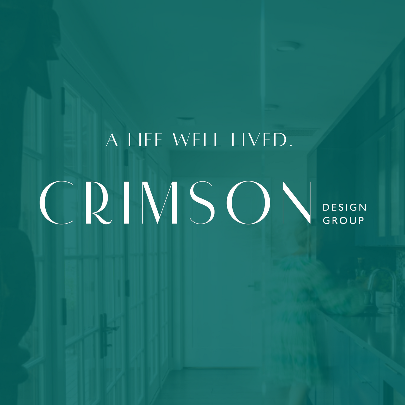 Overlay text reads "A Life Well Lived. Crimson Design Group" on a teal-tinted photo featuring a person in a modern kitchen designed by Crimson Design Group, with sleek cabinets and abundant natural light.