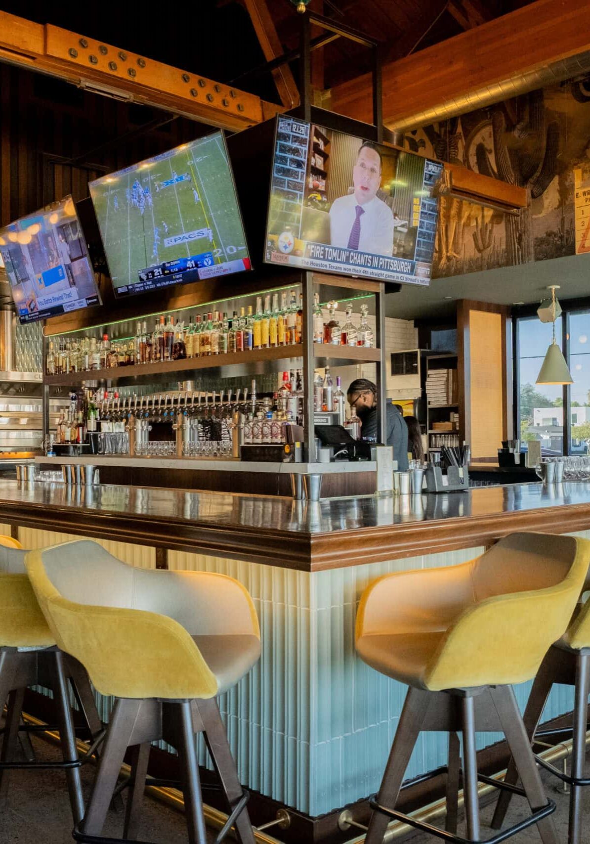 Crimson Design Group's urban retail and hospitality interior design for Trevor's Liquor in Arcadia, Phoenix — high-energy concept built for a tighter footprint.