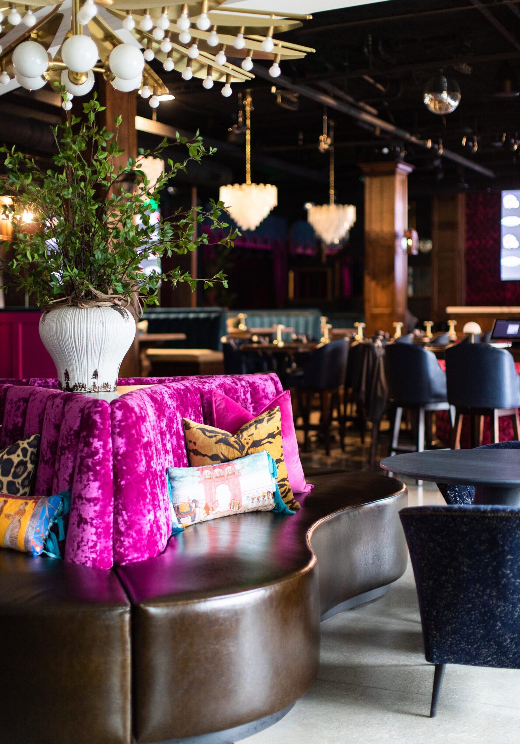 Crimson Design Group's immersive hospitality interior design for Luxe 23 Whiskey Lounge in Columbus' Short North — bold, theatrical, and custom-art driven.