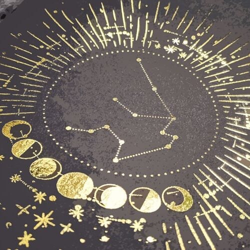 Gold-foil illustration by Crimson Design Group featuring moon phases, a star constellation, and radiating decorative lines on a dark background.