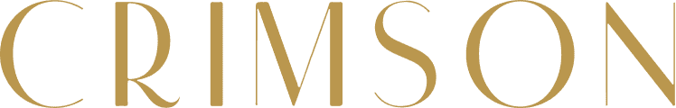 The word "CRIMSON" is displayed in large, gold, elegant serif capital letters on a light background, reflecting the refined aesthetic of Crimson Design Group.