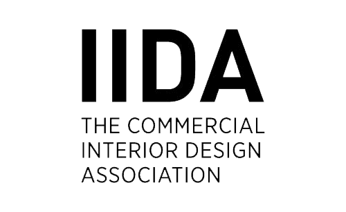 Logo for IIDA, The Commercial Interior Design Association, with bold black letters on a light background.